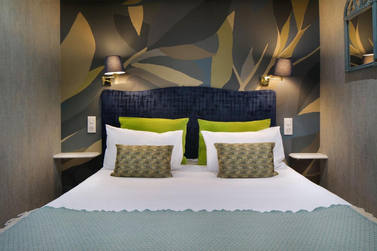 Logis Hotel Les Fuchsias Сен-Вааст-ла-Уг Экстерьер фото