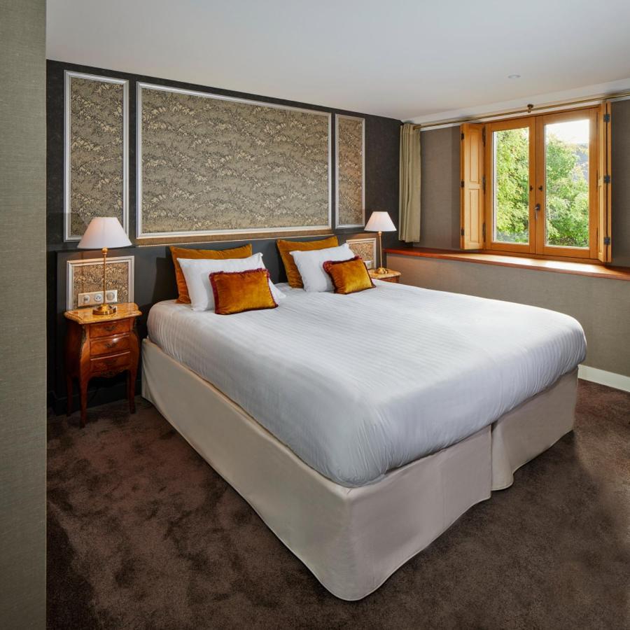 Logis Hotel Les Fuchsias Сен-Вааст-ла-Уг Экстерьер фото
